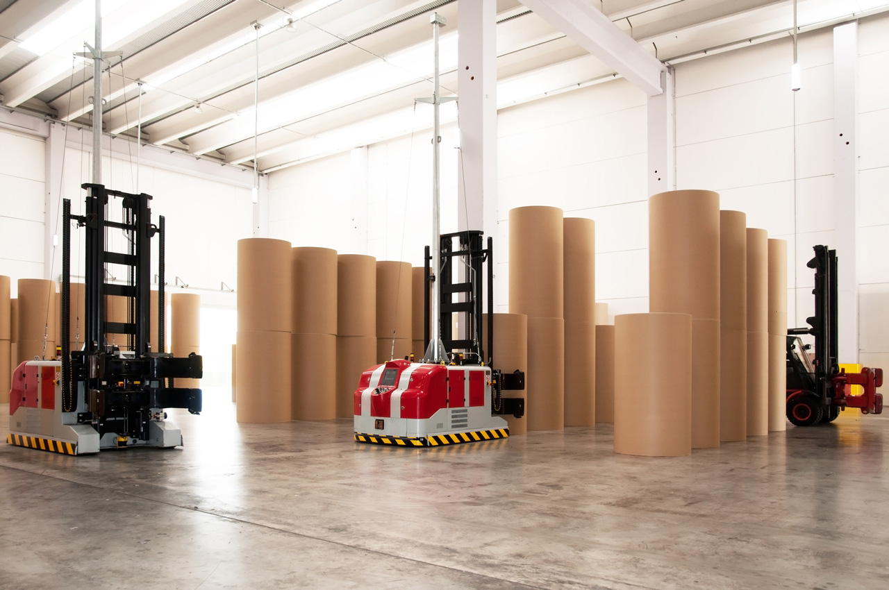 automated-forklift-picking-up-large-paper-roll automated-forklift-picking-up-large-paper-roll